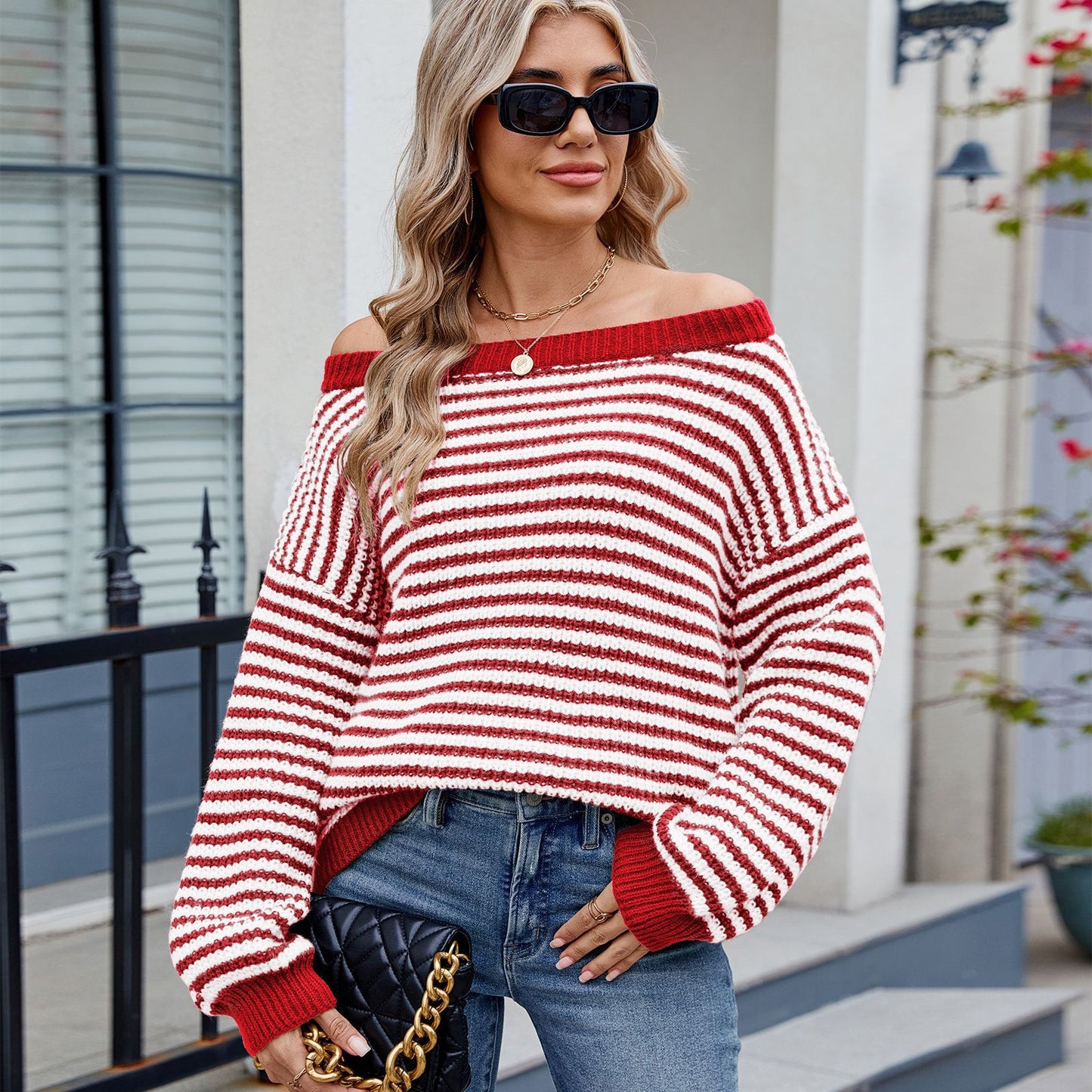 Ladies' round neck knitted sweater with off-the-shoulder design and striped pattern Chic und Stil