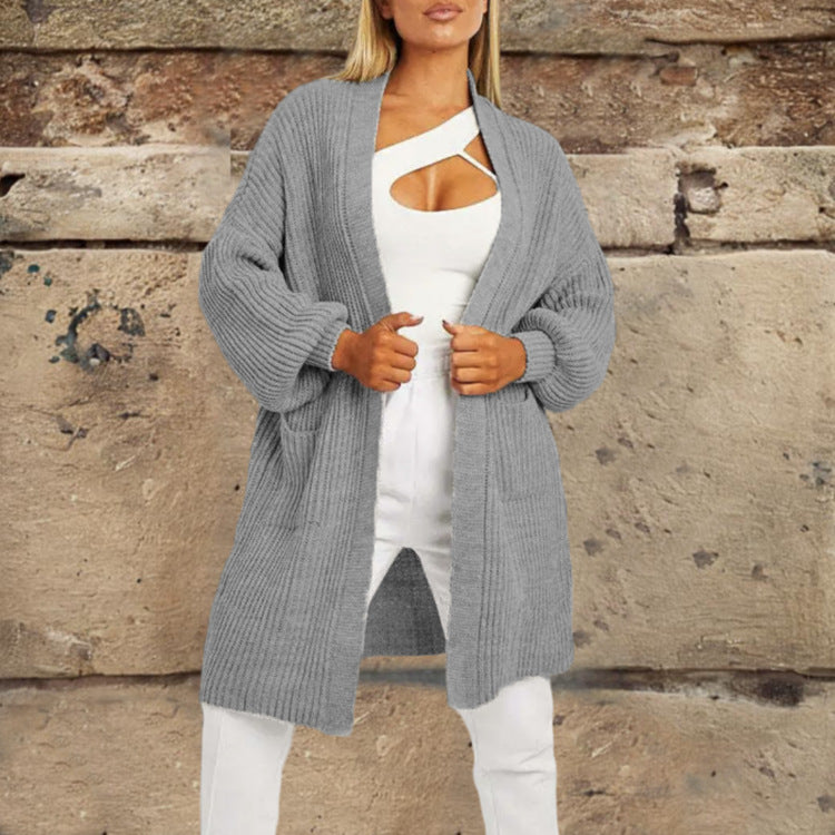 Cardigan tricot pour femmes avec décolleté en V profond et poches généreuses Chic und Stil
