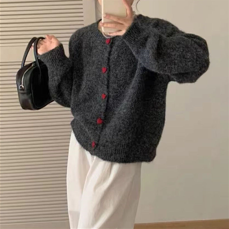 Dames pull-over tricot doux avec boutons en forme de cœur Chic und Stil