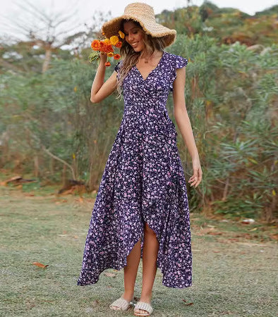 Robe maxi féminine avec manches fluides et différence de hauteur florale Chic und Stil
