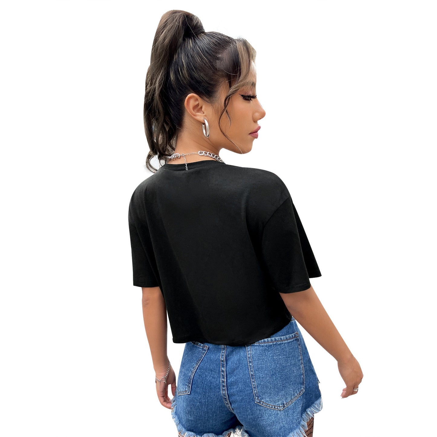 T-shirt crop pour femmes avec motif en relief Chic und Stil