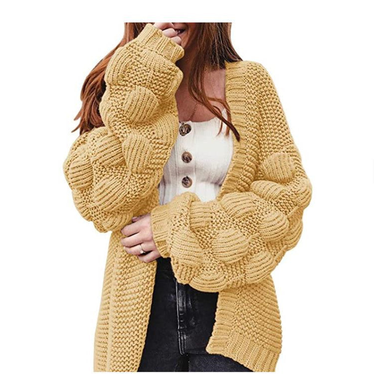 Veste en tricot pour femmes avec des manches bouffantes volumineuses et un aspect de maille structuré Chic und Stil