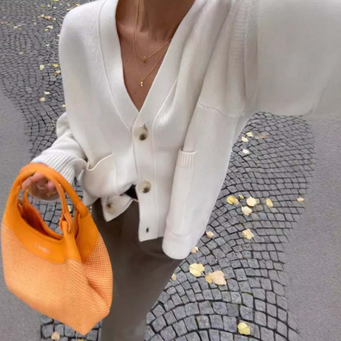 Cardigan féminin en tricot surdimensionné avec poches et décolleté en V Chic und Stil