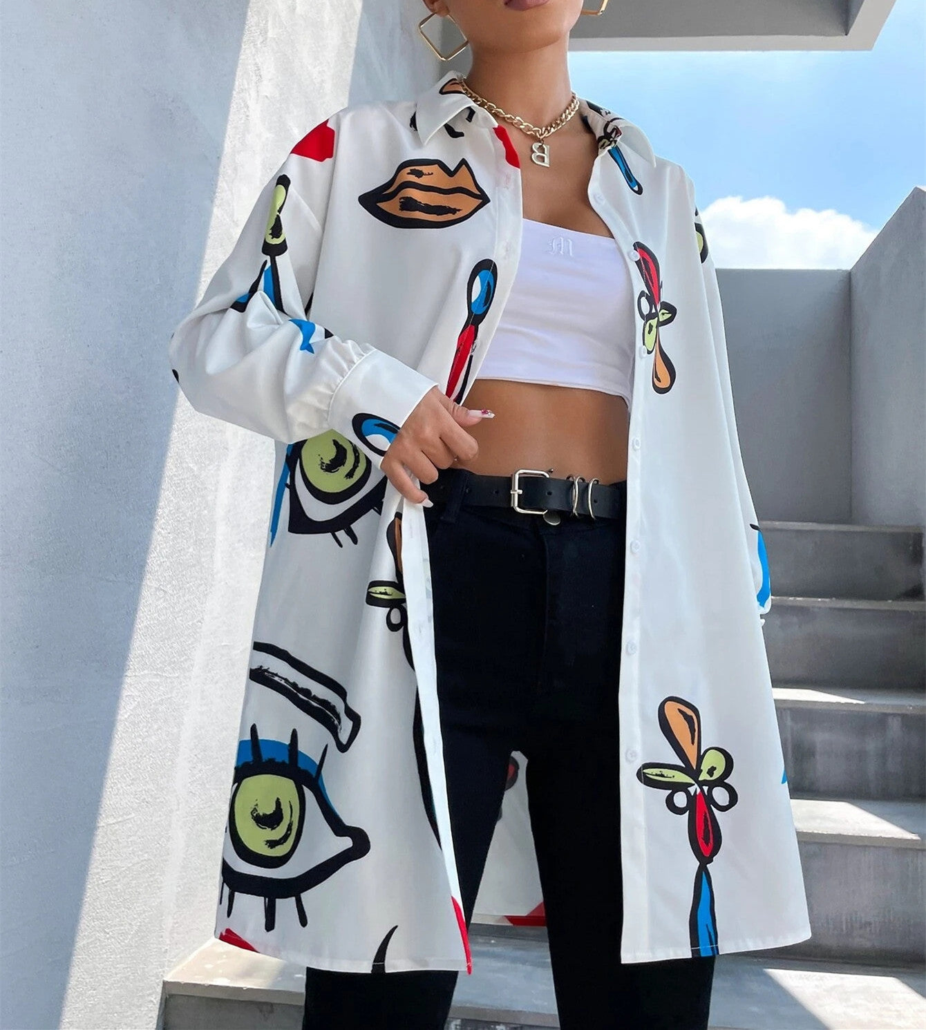 Blouse à carreaux tendance pour femmes avec un design graphique coloré Chic und Stil
