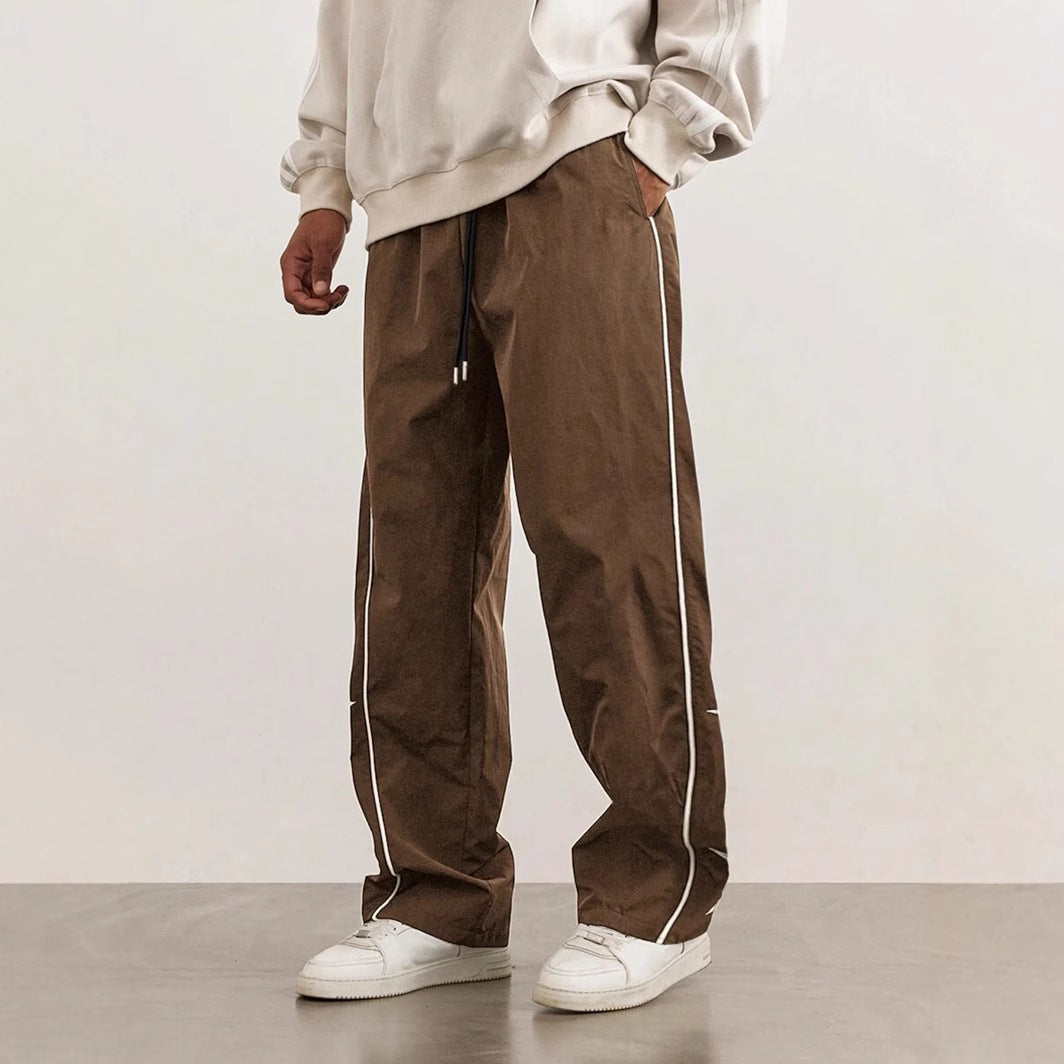 Pantalons de loisirs pour hommes avec bandes de contraste latérales Chic und Stil