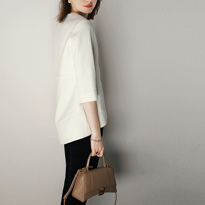 Blouse texturée élégante pour femmes avec détail de bouton décoratif Chic und Stil