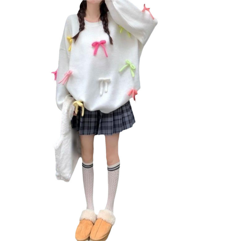 Pull décontracté pour femmes avec des appliqués de nœuds ludiques Chic und Stil