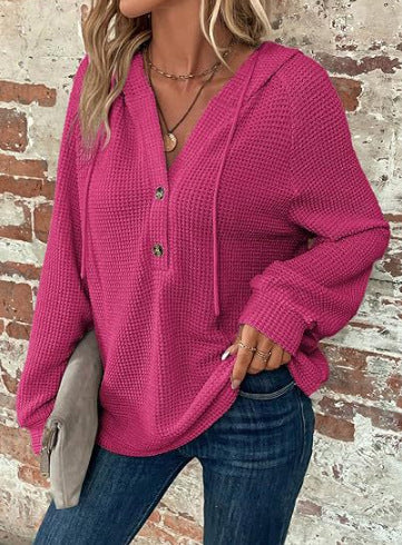 Pull à capuche décontracté pour femmes avec des détails en boutons et un tissu structuré Chic und Stil