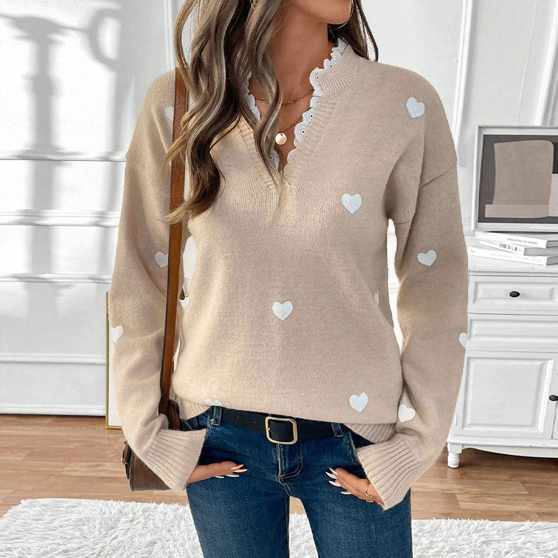 Pull femme à appliqués en forme de cœur Chic und Stil