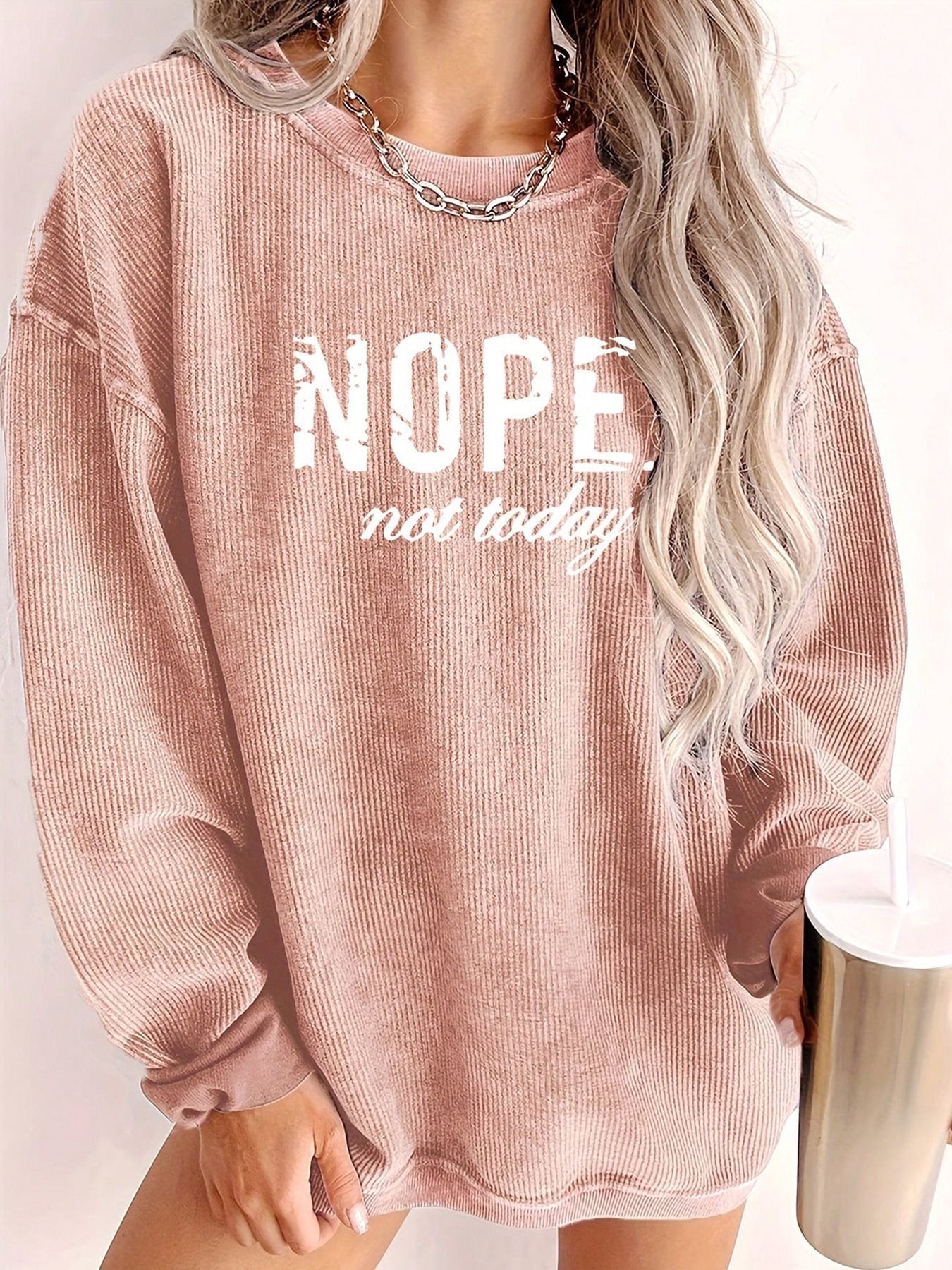 Pull oversized décontracté pour femmes avec impression statement et texture côtelée Chic und Stil