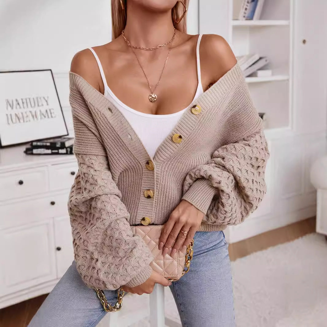 Veste en tricot pour femmes avec des manches texturées et des détails de boutons Chic und Stil