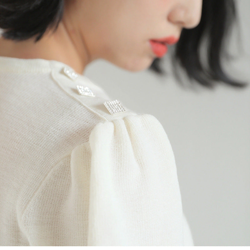 Haut en tricot à manches courtes pour femmes avec accents de boutons Chic und Stil