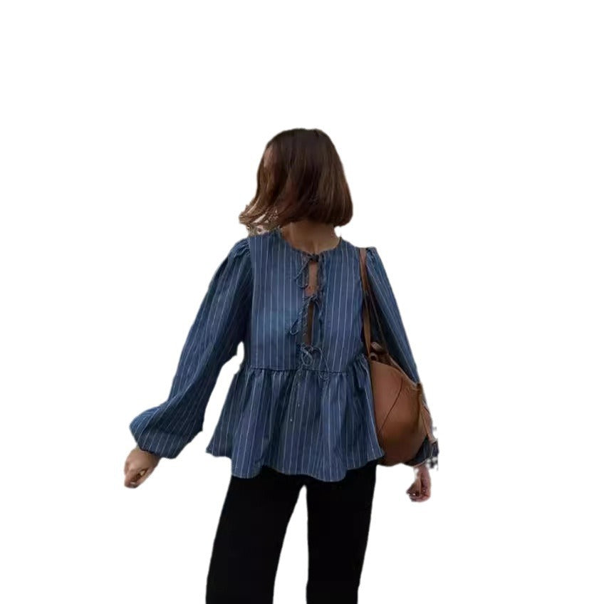 Chemisier rayé pour femmes avec des manches bouffantes volumineuses et une coupe cintrée Chic und Stil