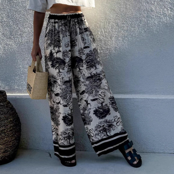 Wide palazzo pants for Damen with floral pattern and elastic waistband Chic and Style