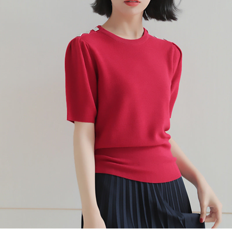 Haut en tricot à manches courtes pour femmes avec accents de boutons Chic und Stil