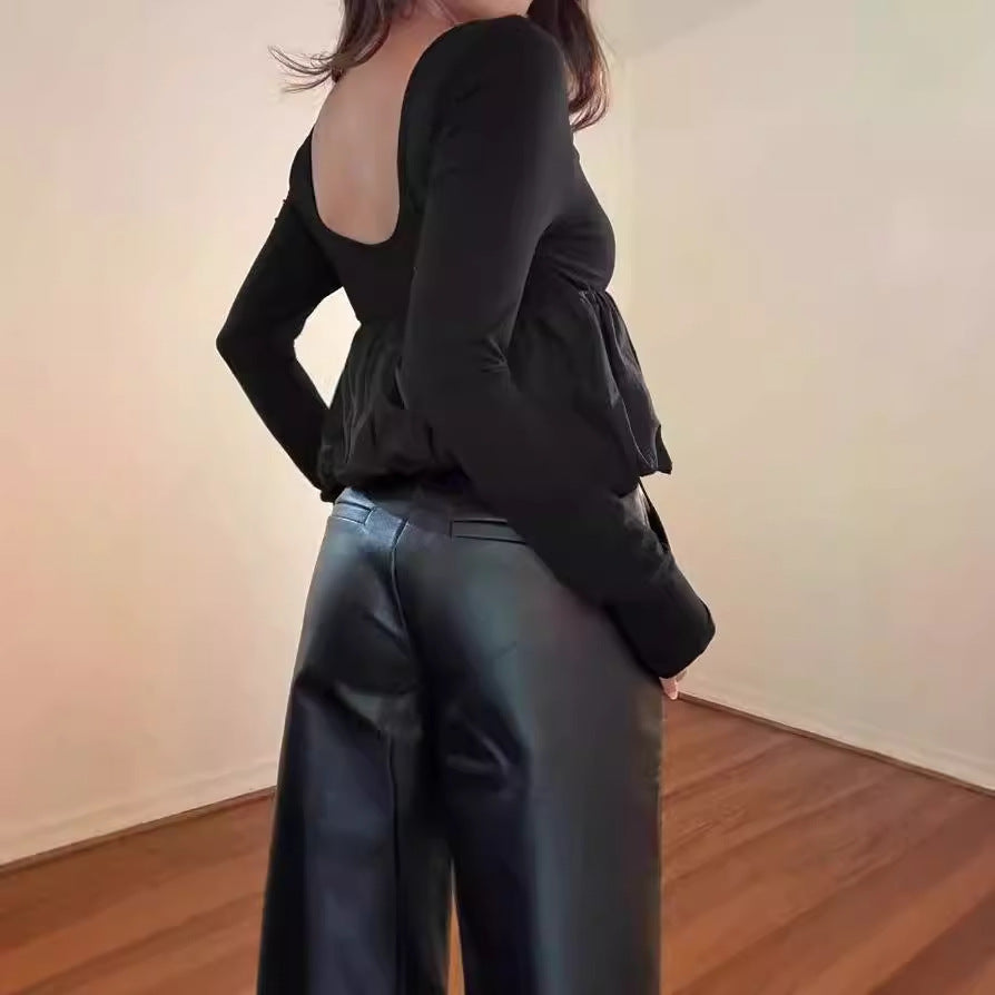 Elegant ladies' shirt with pleated design and wide hem. Chic and stylish.