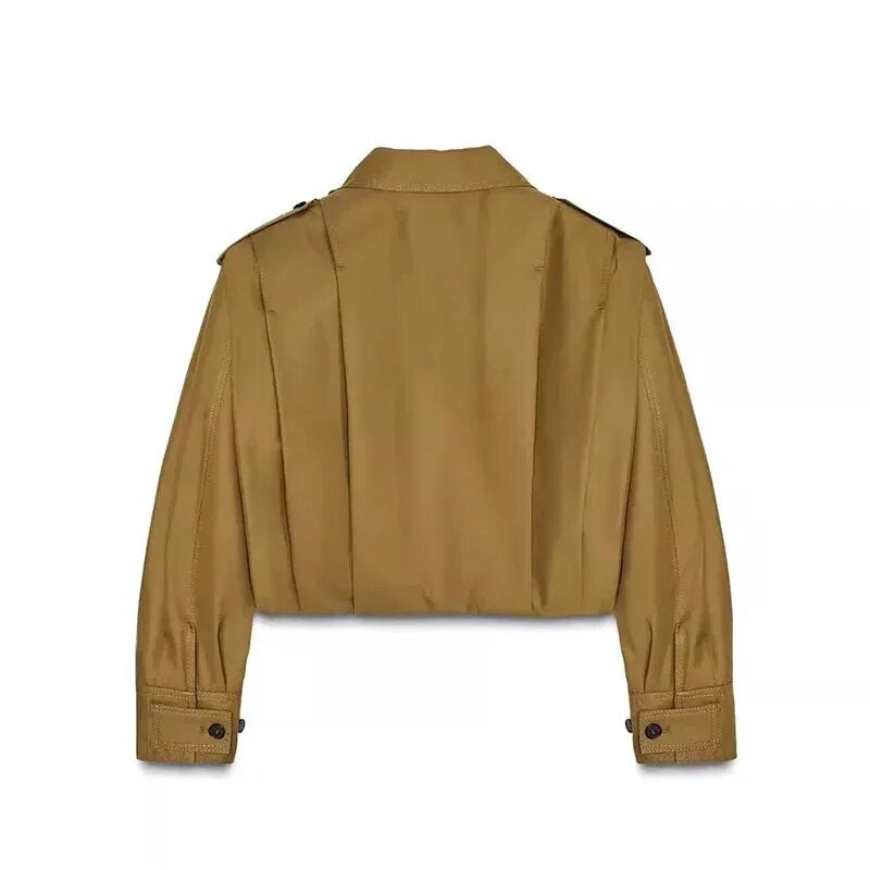 Blouse cintrée féminine à détails de boutons continus Chic und Stil
