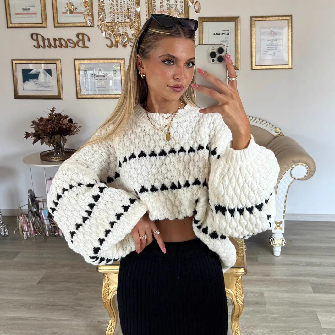 Pull féminin tendance avec une coupe ample et un design structuré Chic und Stil