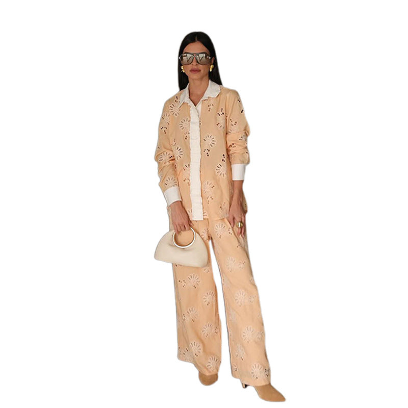 Two-piece women's set with decorative crochet patterns and a wide cut. Chic and stylish.