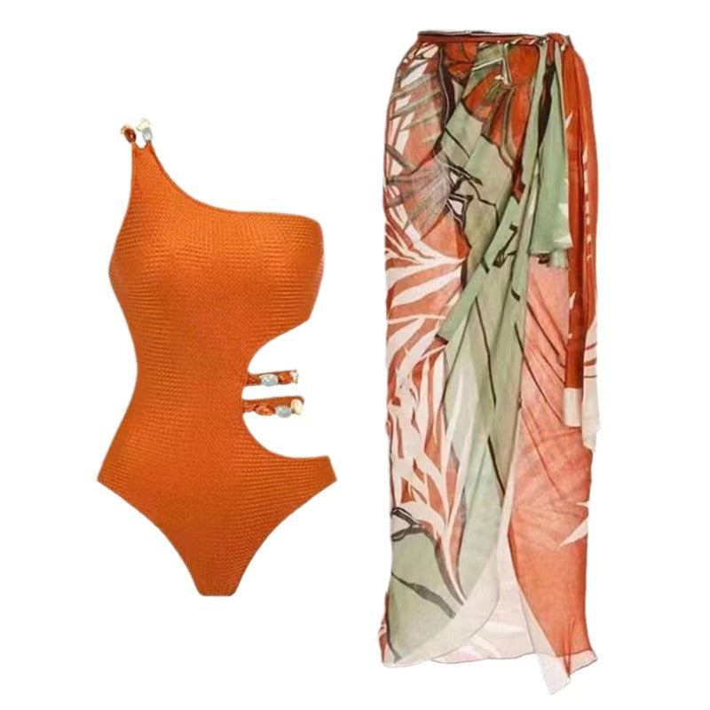 Maillot de bain une pièce pour femme avec découpes raffinées et jupe élégante Chic und Stil