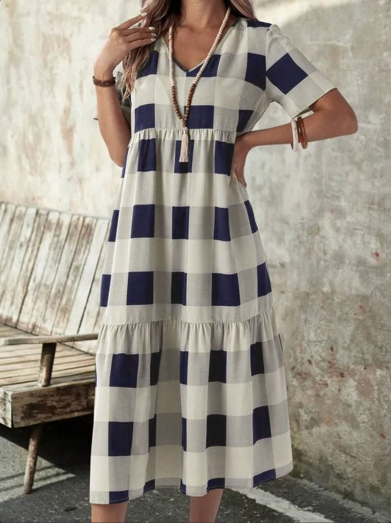 Robe longue à manches longues pour femmes avec un motif à carreaux à la mode et une coupe fluide Chic und Stil