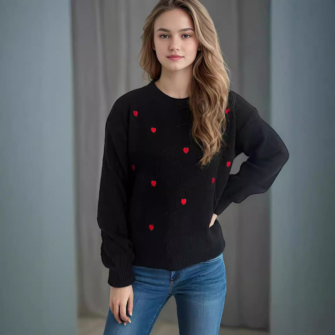 Pull femme avec un design de cœur ludique Chic und Stil
