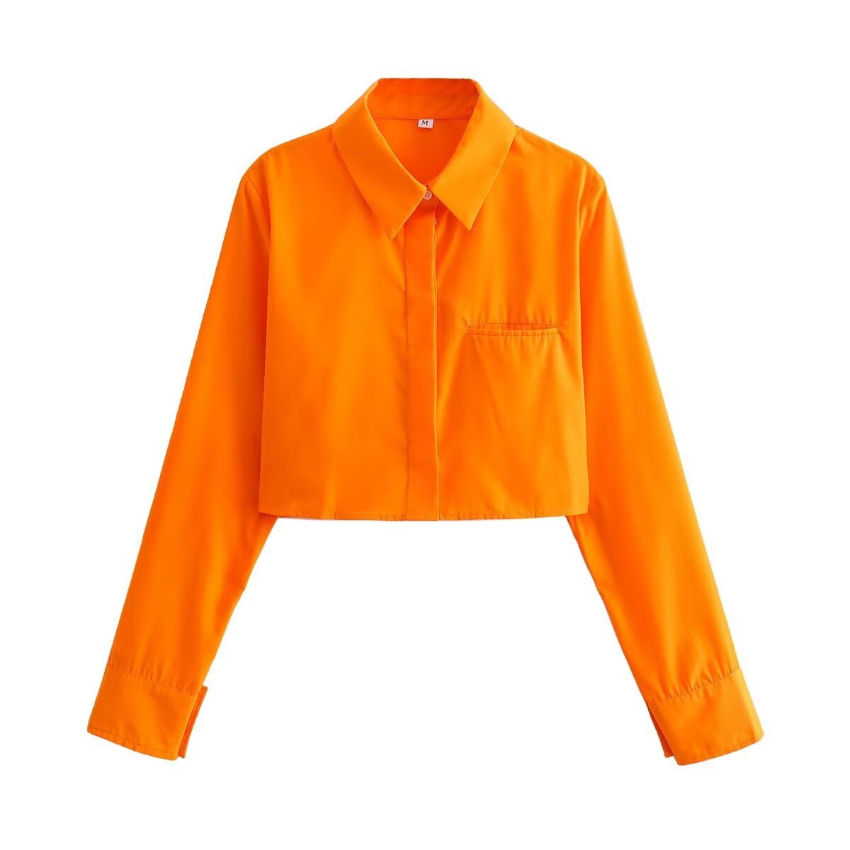 Blouse cropped pour femmes avec col classique et poches poitrine pratiques Chic und Stil