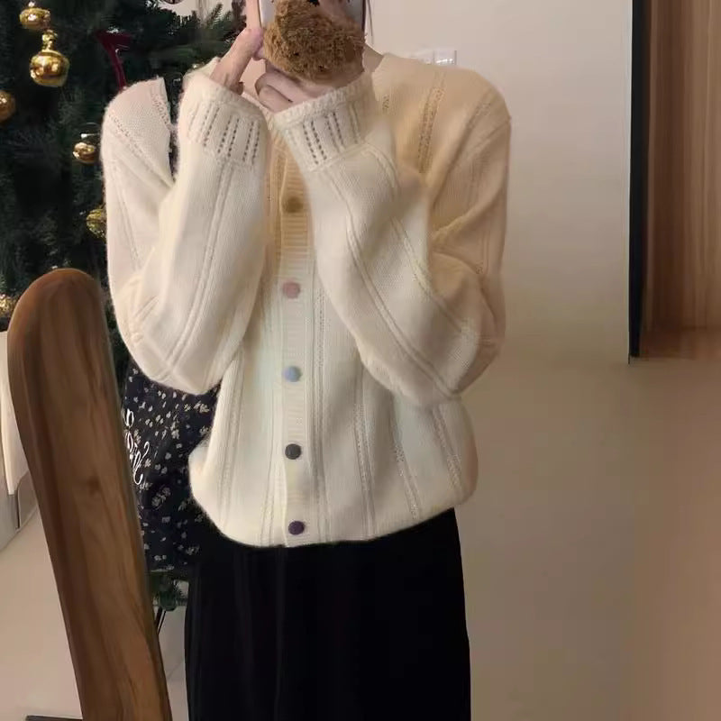 Cardigan en gros tricot pour femmes avec une fermeture à boutons élégante et des manches larges Chic und Stil