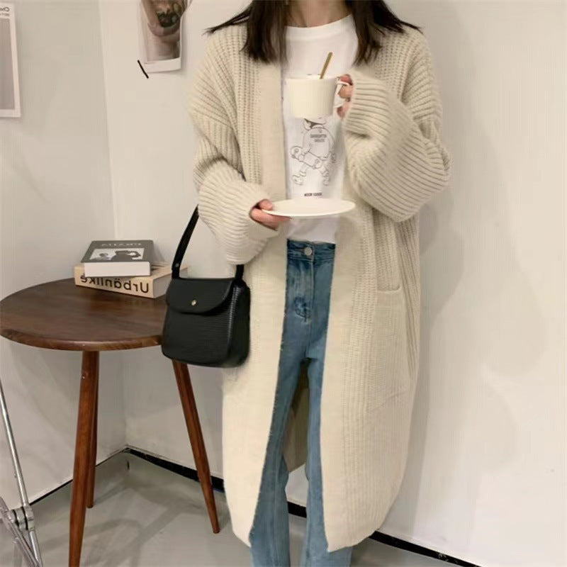 Cardigan en tricot féminin avec une silhouette décontractée et des poches profondes Chic und Stil