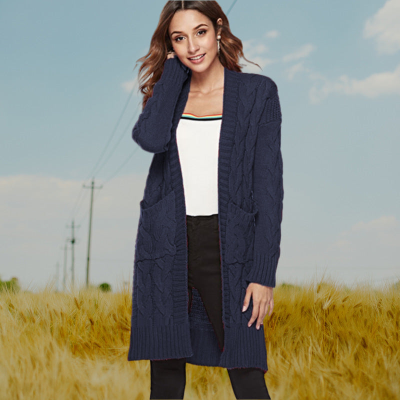 Cardigan en gros tricot pour femmes avec un élégant design en torsade et des poches pratiques Chic und Stil