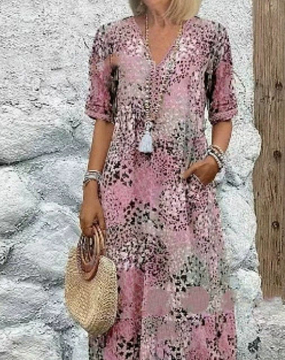 Robe maxi femme avec décolleté en V et poches latérales pratiques Chic und Stil