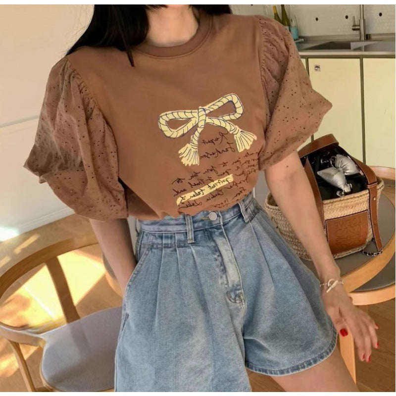 Chic und Stil women's puff sleeve graphic tee set and high waisted denim shorts