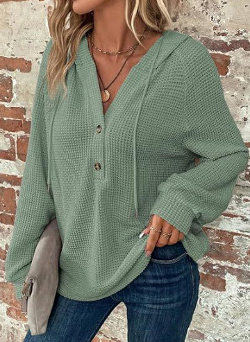 Pull à capuche décontracté pour femmes avec des détails en boutons et un tissu structuré Chic und Stil