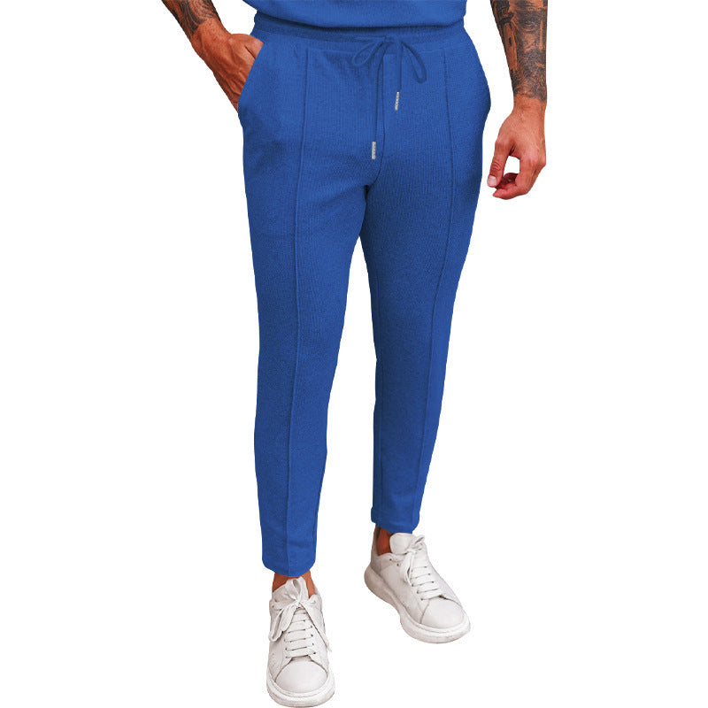 Pantalon de jogging sportif pour hommes avec taille élastique et poches zippées Chic und Stil