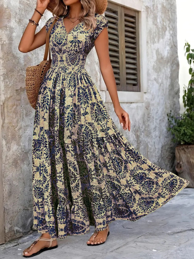 Robe maxi à fleurs pour femmes avec décolleté en V et ourlet à volants Chic und Stil