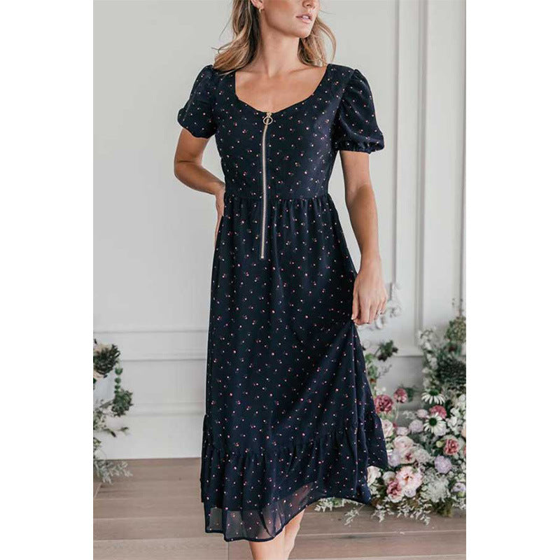 Robe midi florale raffinée pour femmes avec manches bouffantes et détail de fermeture éclair Chic und Stil