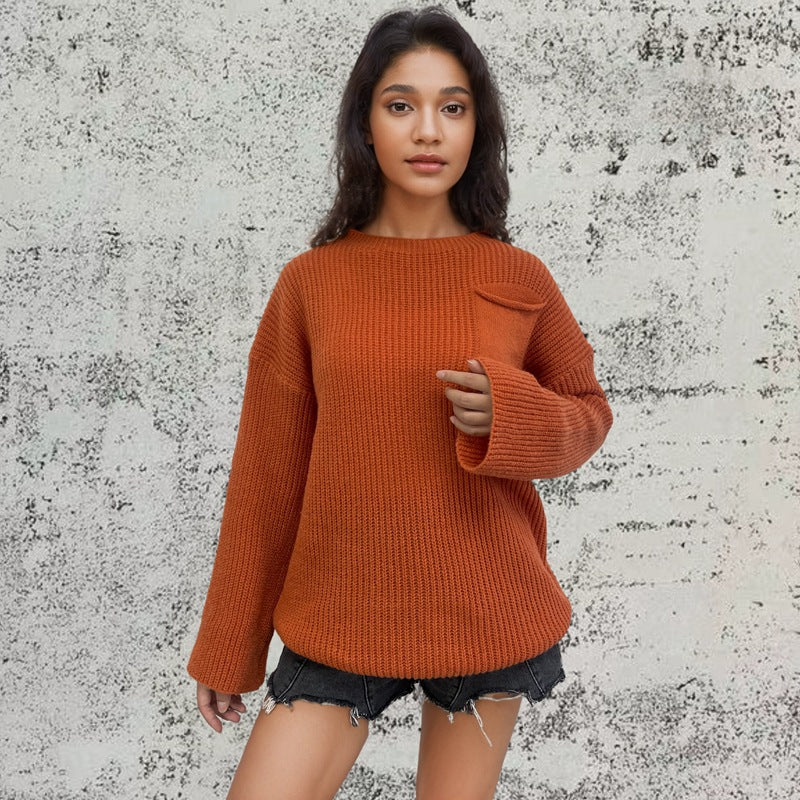 Sweat à col rond tricoté en gros mailles pour femmes avec une coupe décontractée et une poche pratique Chic und Stil