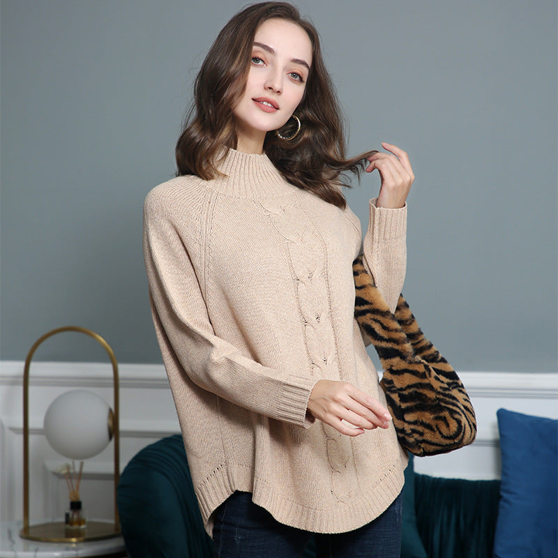 Pull en grosse maille pour femmes avec un col montant et des motifs en torsades Chic und Stil
