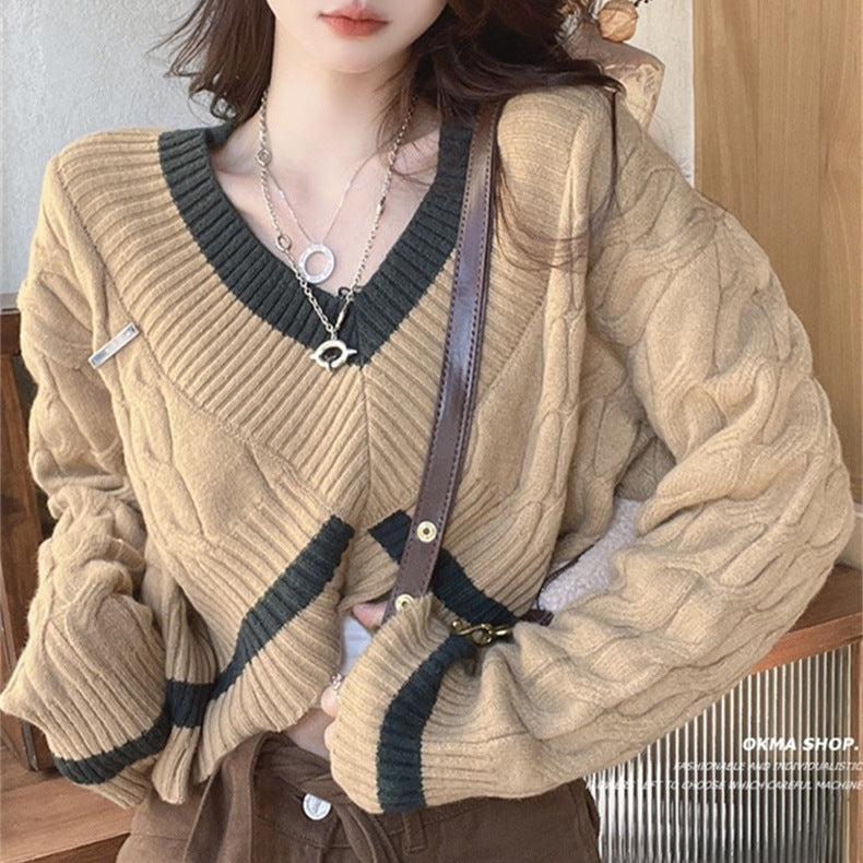 Dames pull cropped stylé avec décolleté en V et motif en losange Chic und Stil