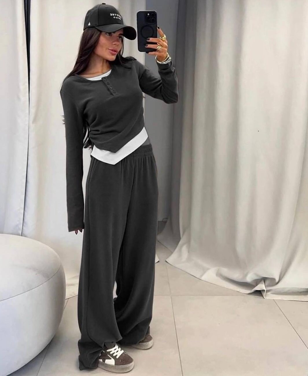 Fashionable lounge set for women with a versatile top and chic elastic pants.