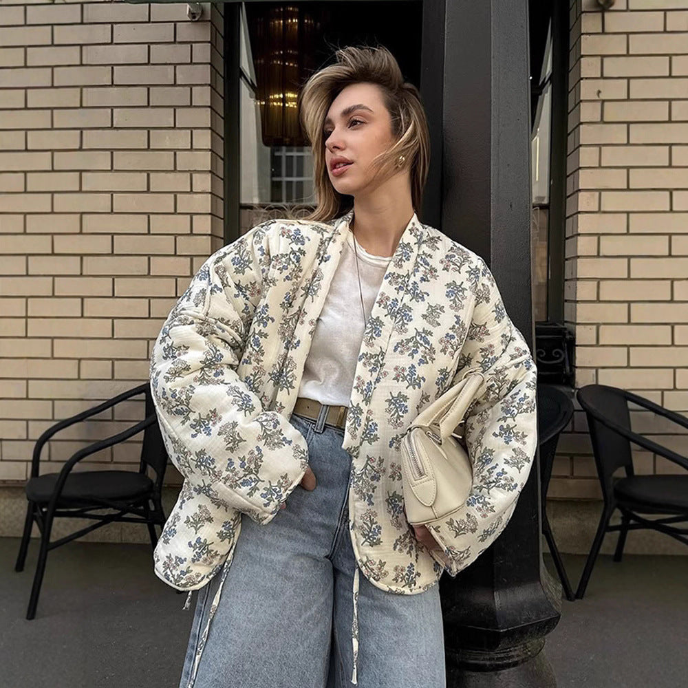 Cardigan matelassé pour dames en jacquard à motif floral Chic und Stil
