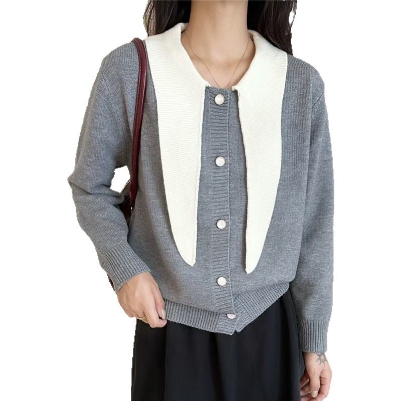 Cardigan féminin à la mode avec écharpe décorative et détails de bouton Chic und Stil