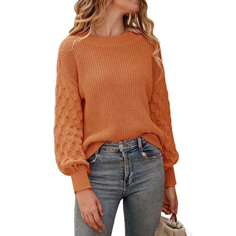 Pull en tricot pour femmes avec des manches à volants structurés et un col rond Chic und Stil