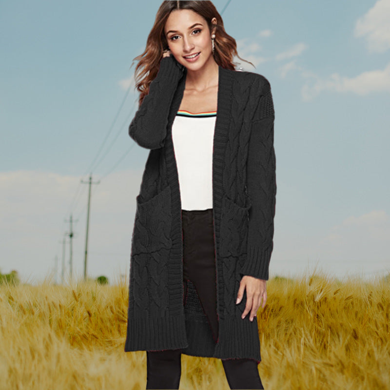 Cardigan en gros tricot pour femmes avec un élégant design en torsade et des poches pratiques Chic und Stil