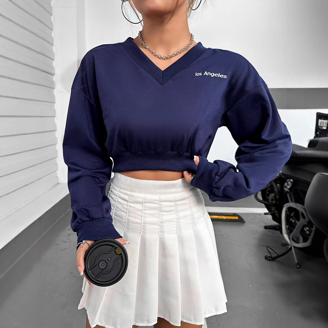 Sweatshirt cropped pour femmes à col V avec des manches volumineuses Chic und Stil