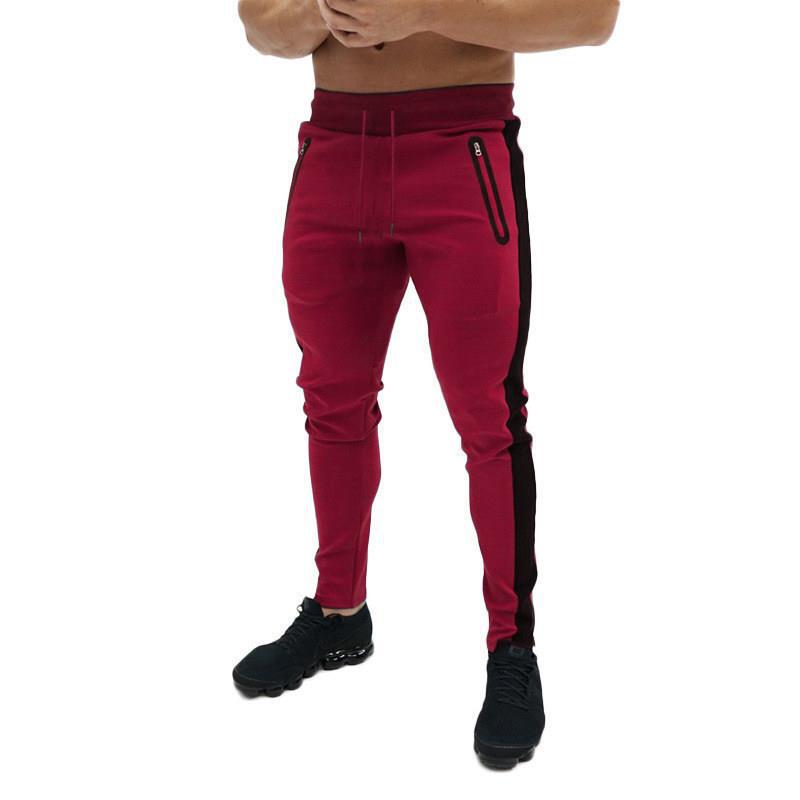 Pantalon de jogging sportif pour hommes avec poches zippées latérales Chic und Stil