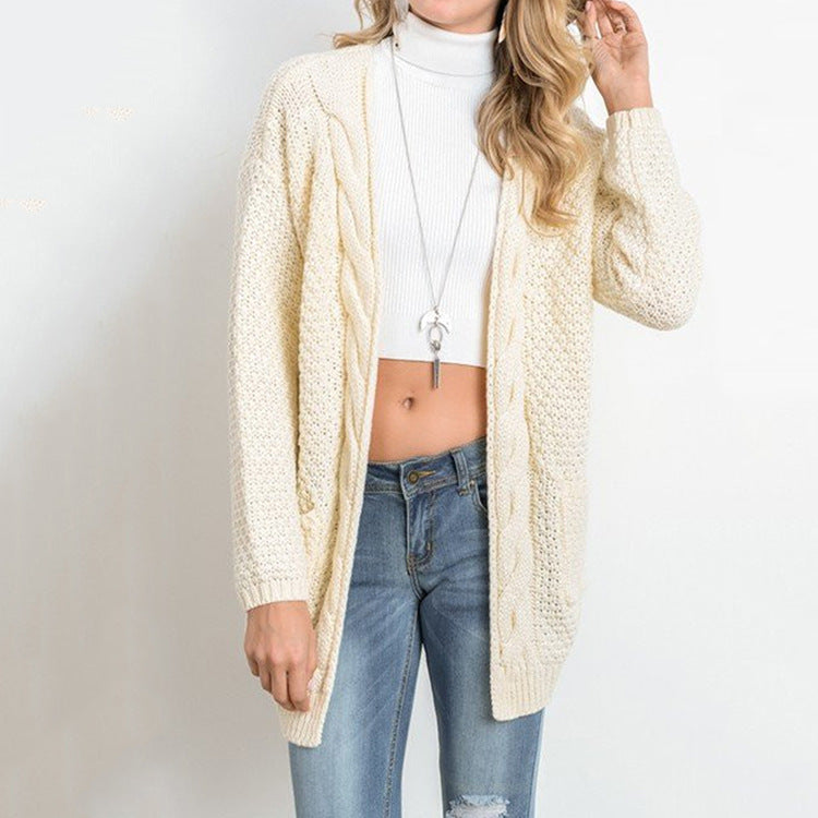 Veste en tricot pour femmes avec poches et structure à motifs en torsades détaillée Chic und Stil