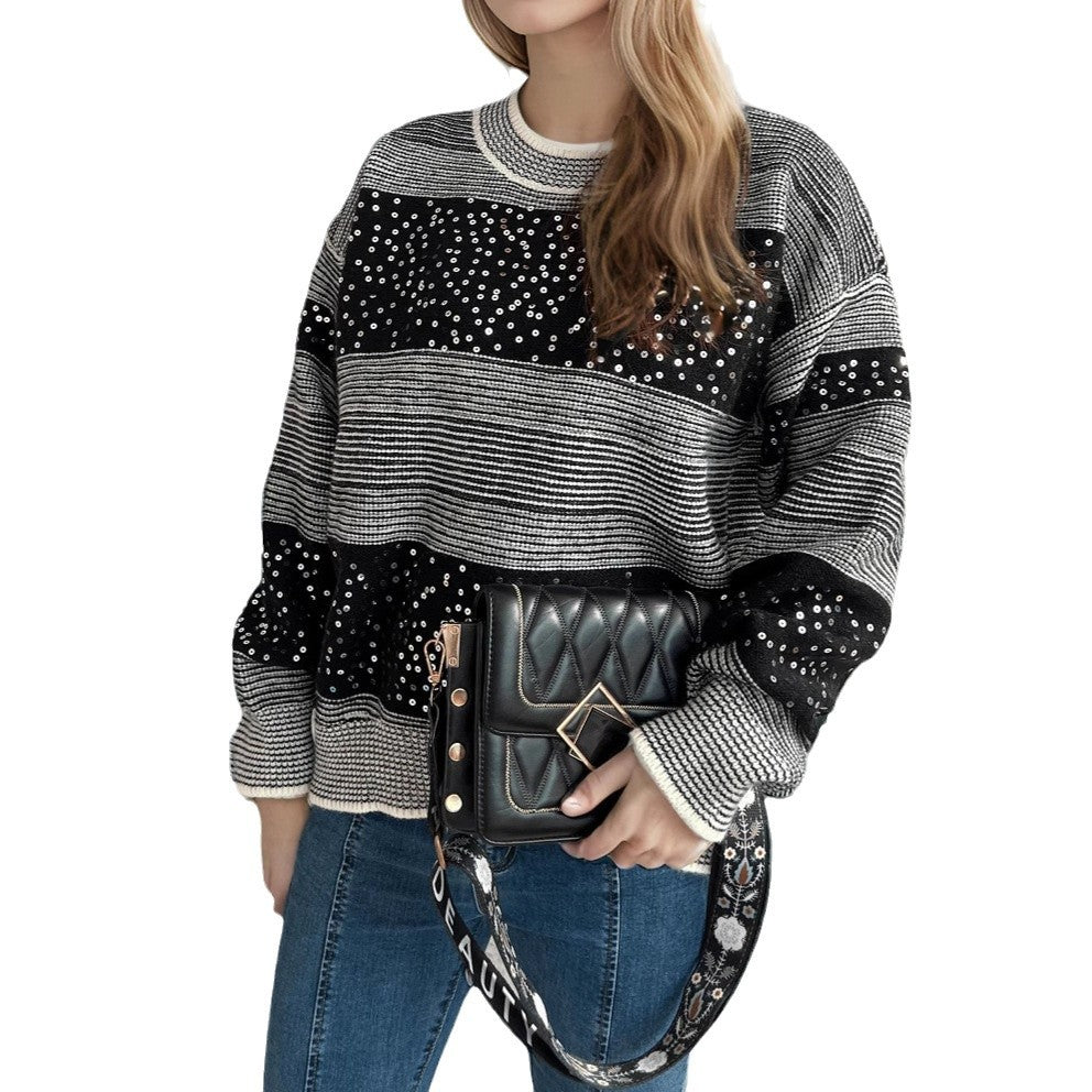 Pull féminin à la mode avec des appliqués scintillants Chic und Stil