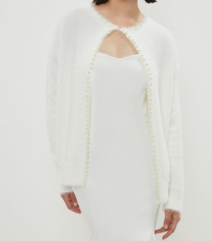 Ladies cozy pullover with pearl embellishment Chic and Style