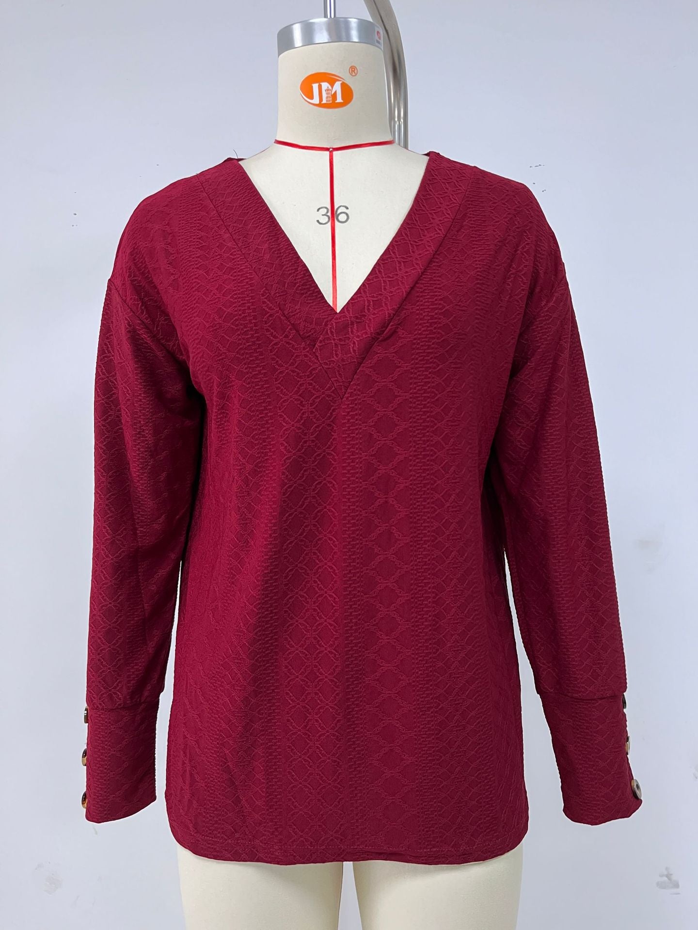 Blouse à manches longues pour femme avec un décolleté en V raffiné et un design structuré Chic und Stil